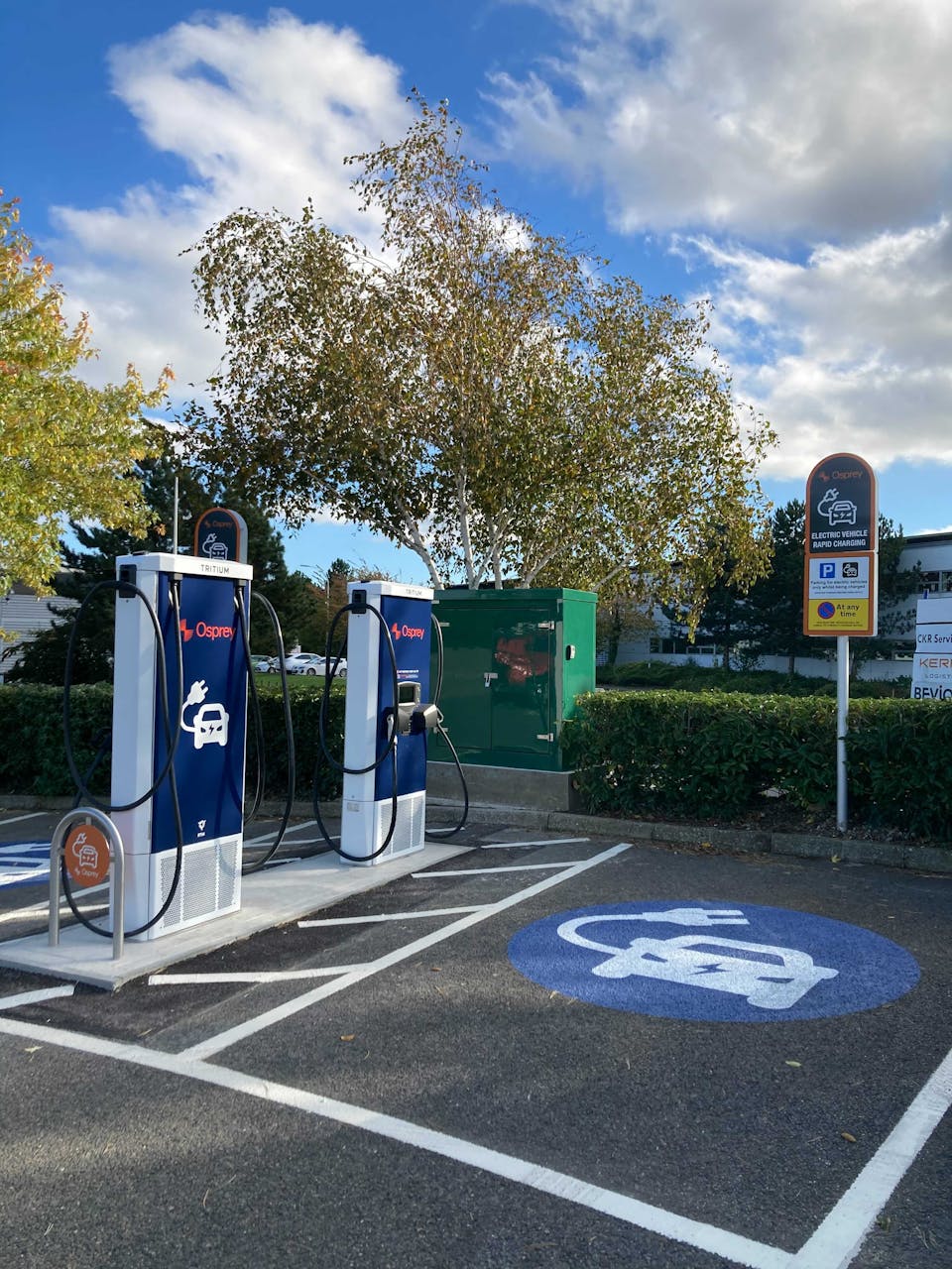 Two blue Osprey branded charge points with accessible charging bays.