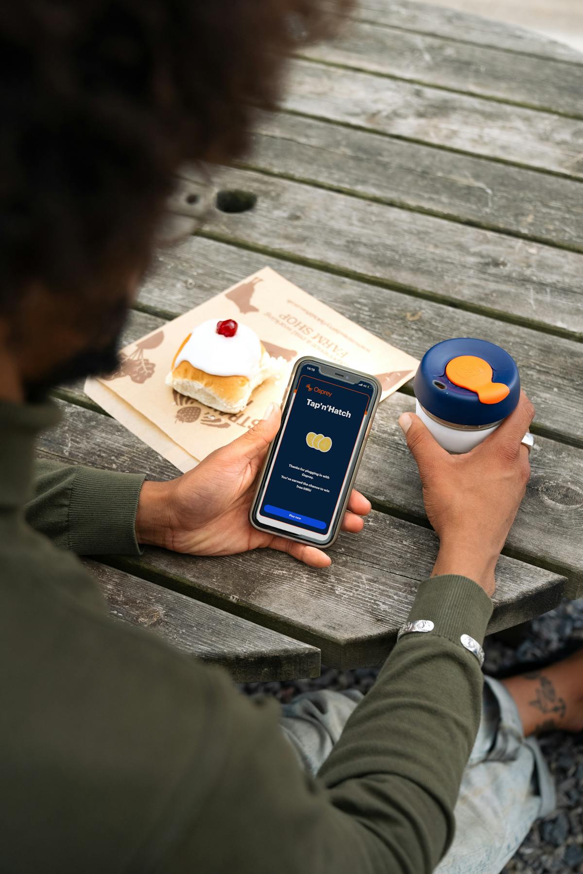 Man using Osprey Hatch Rewards in the Osprey App