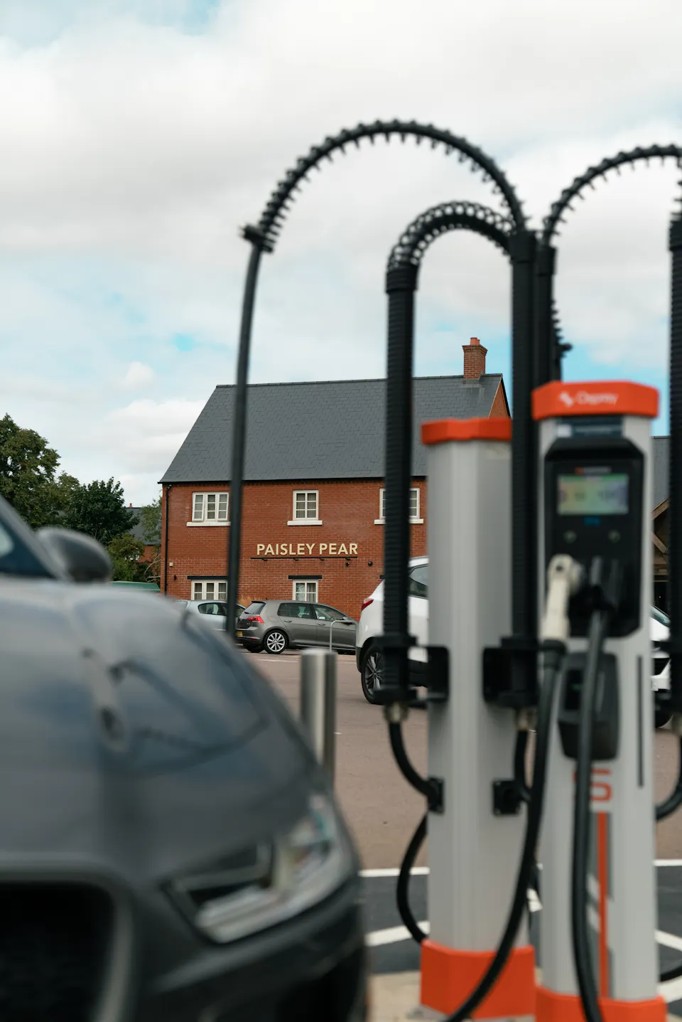 Paisley Pear restaurant with two rapid EV chargers in front.