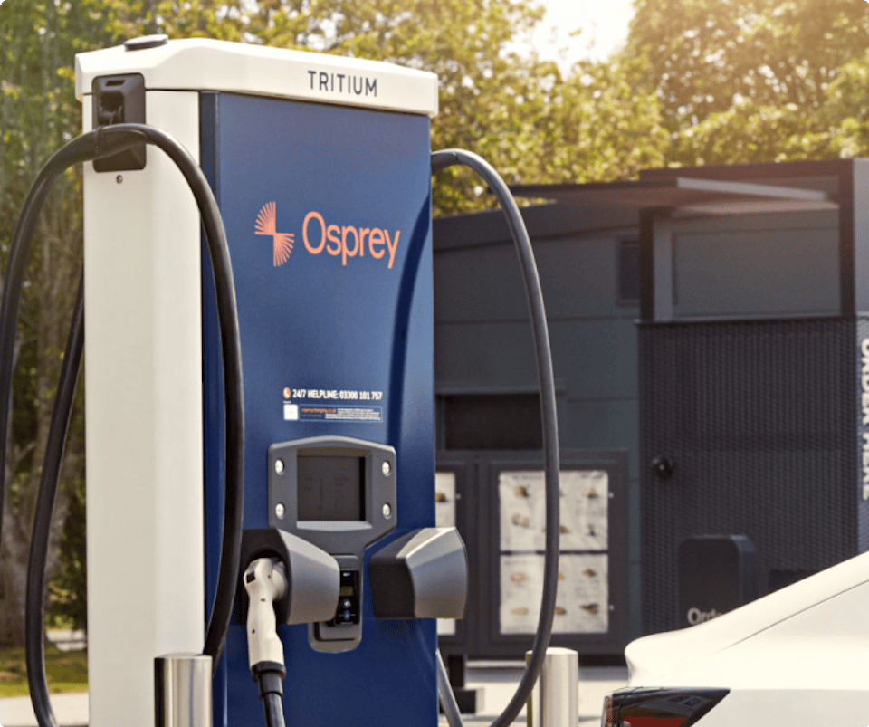 The Osprey logo on a dark blue background on a 75kW Osprey charger