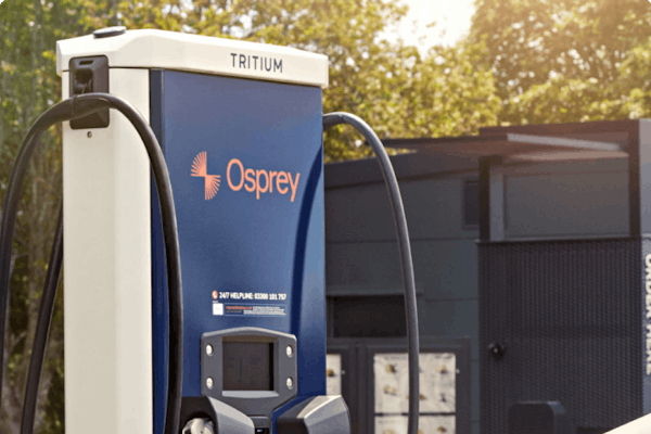 The Osprey logo on a dark blue background on a 75kW Osprey charger