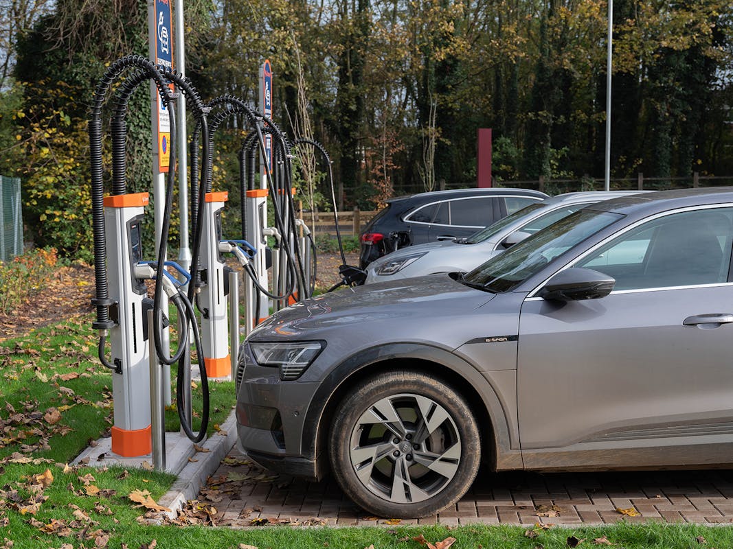 Electric cars plugged in to an ultra-rapid Osprey EV charging station