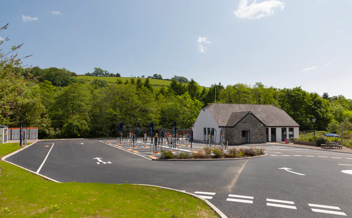 An Osprey rapid EV charging hub with 16 150kW charging stations and a cafe.