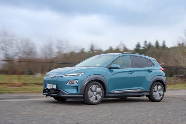 Blue Hyundai Kona electric car driving