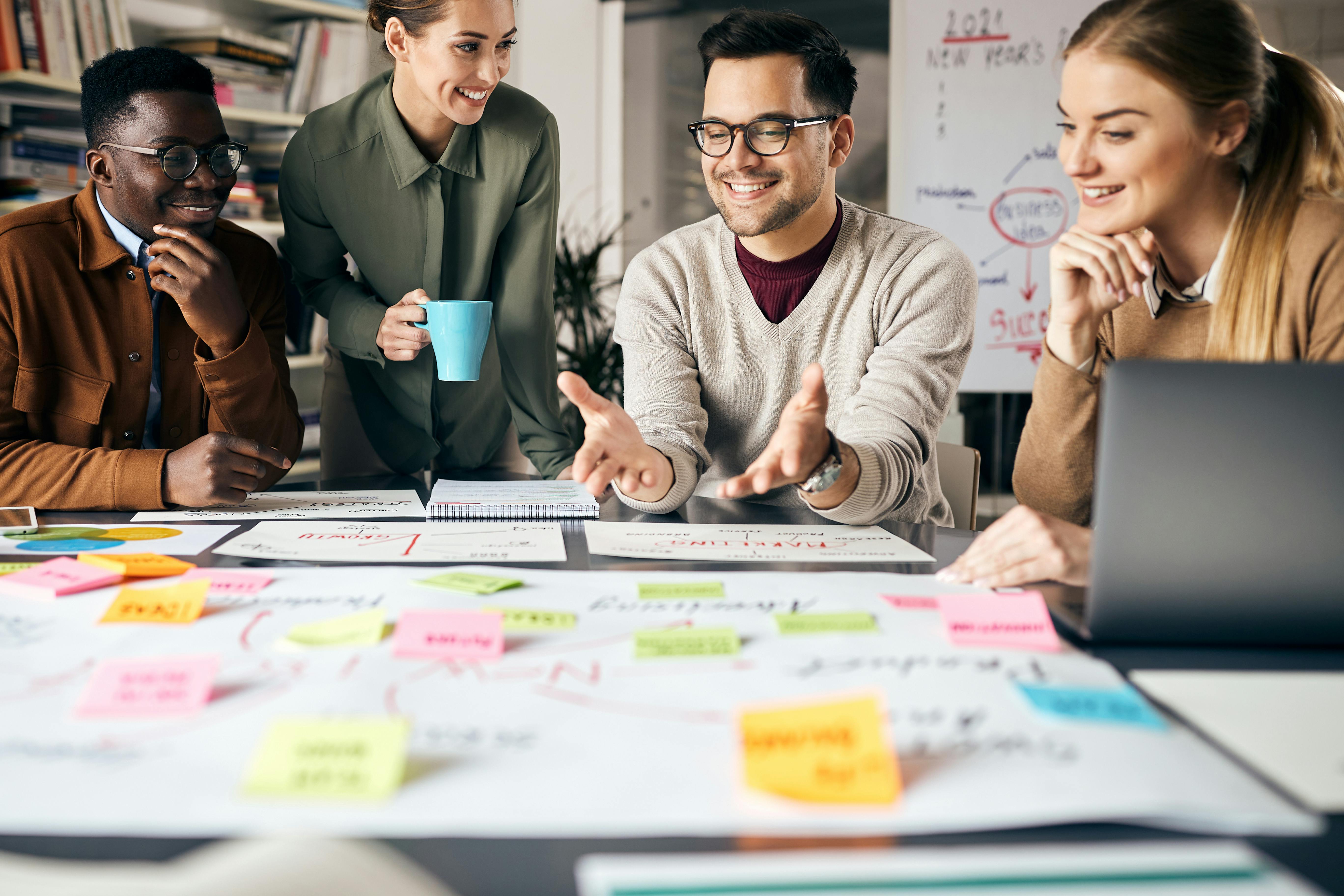 Image of people working in business setting