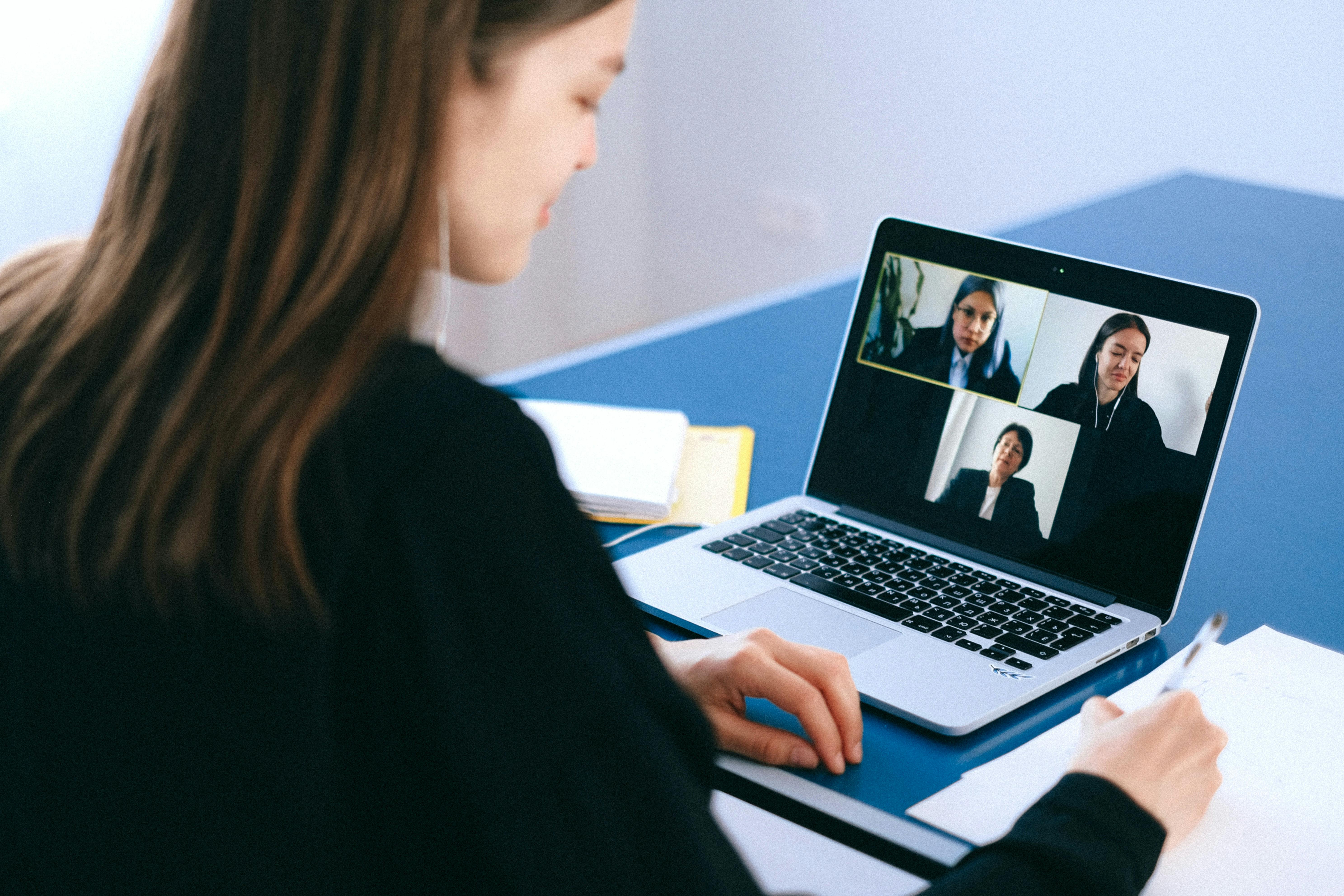 Students on video call with teacher.