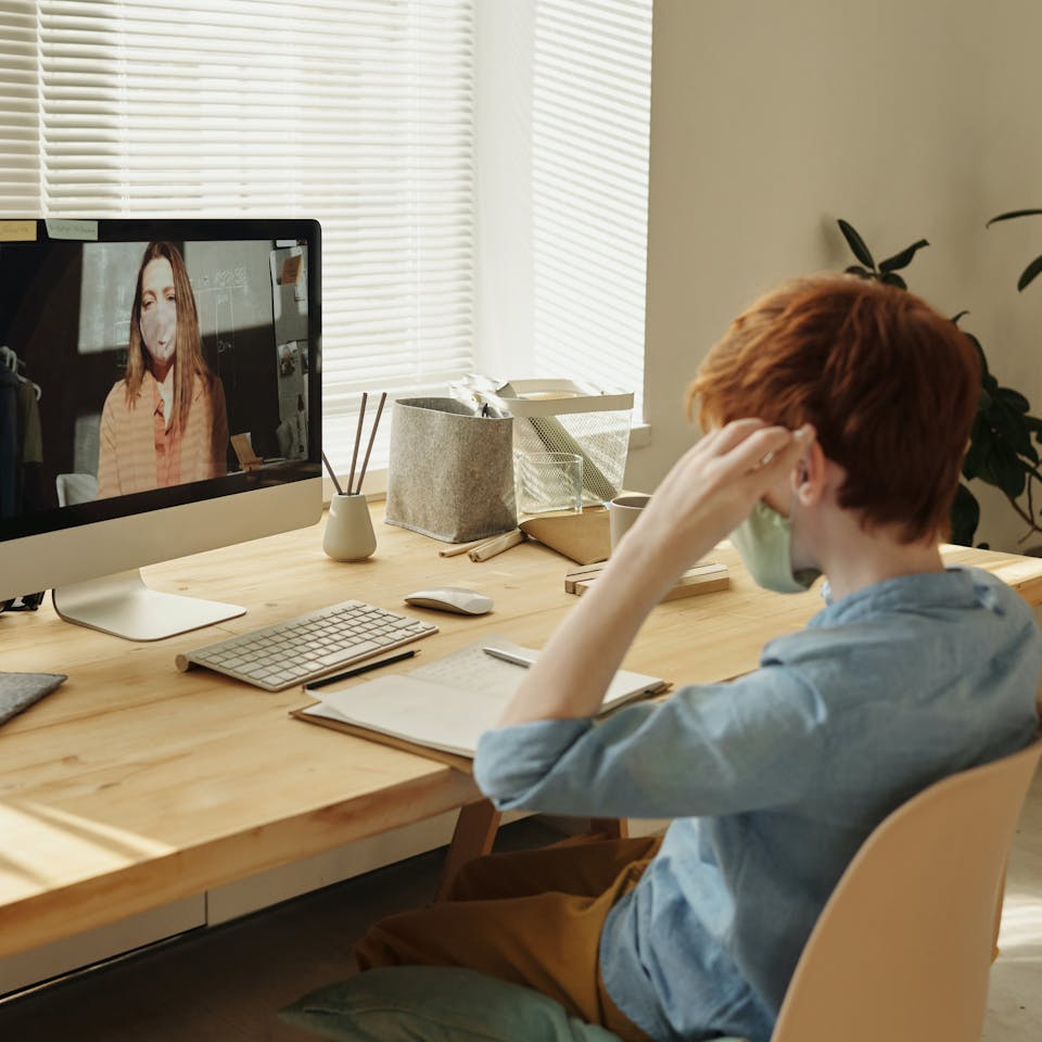 Student studying from home on an online class.