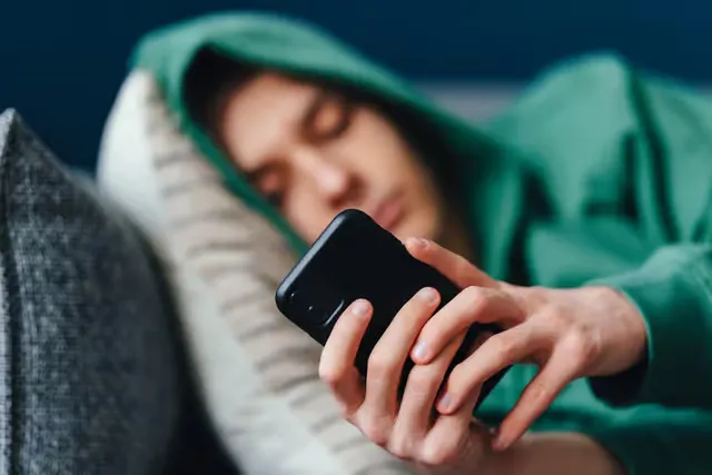 Teenager on their smartphone