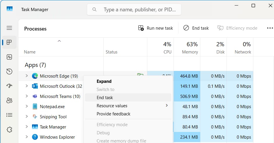 Screenshot of Task Manager showing Process open with list of running Apps and the context menu expanded to show End task in the list.