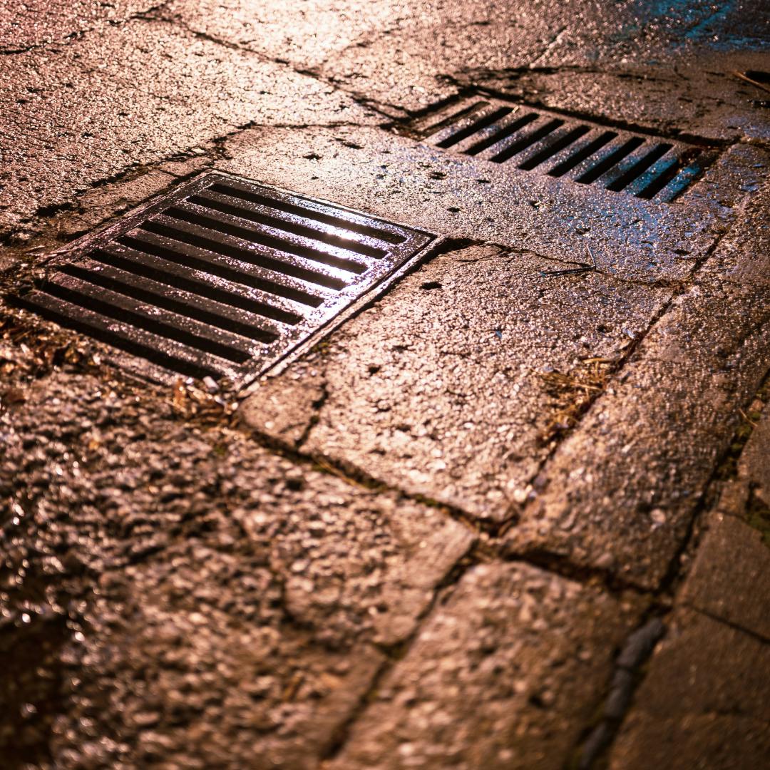 Two adjacent surface water drains