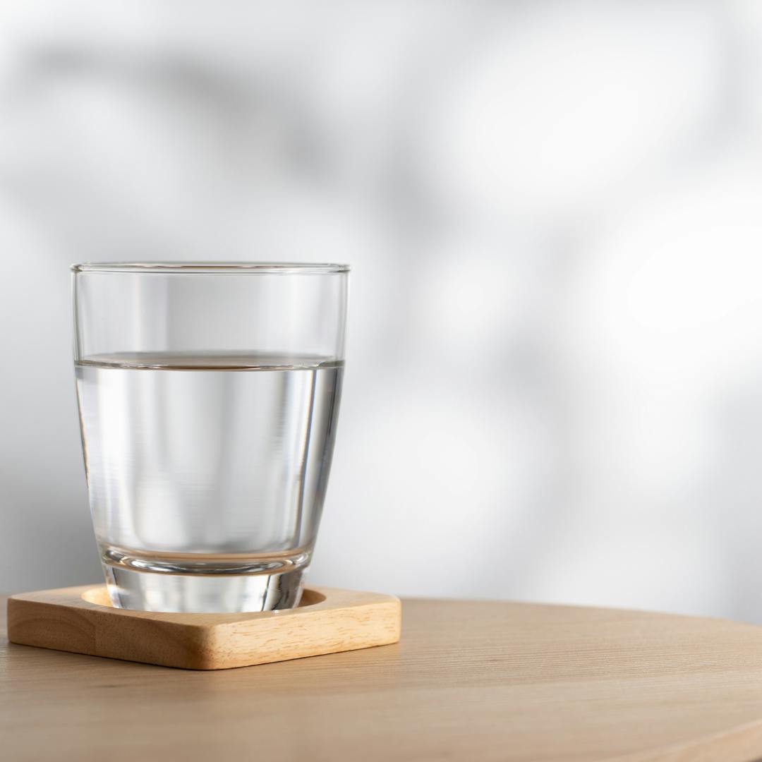 A glass of water on a table