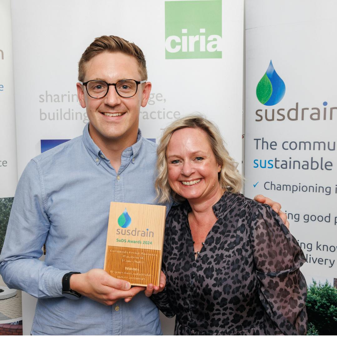 Craig (left) and Sarah (right) hold susdrain award 