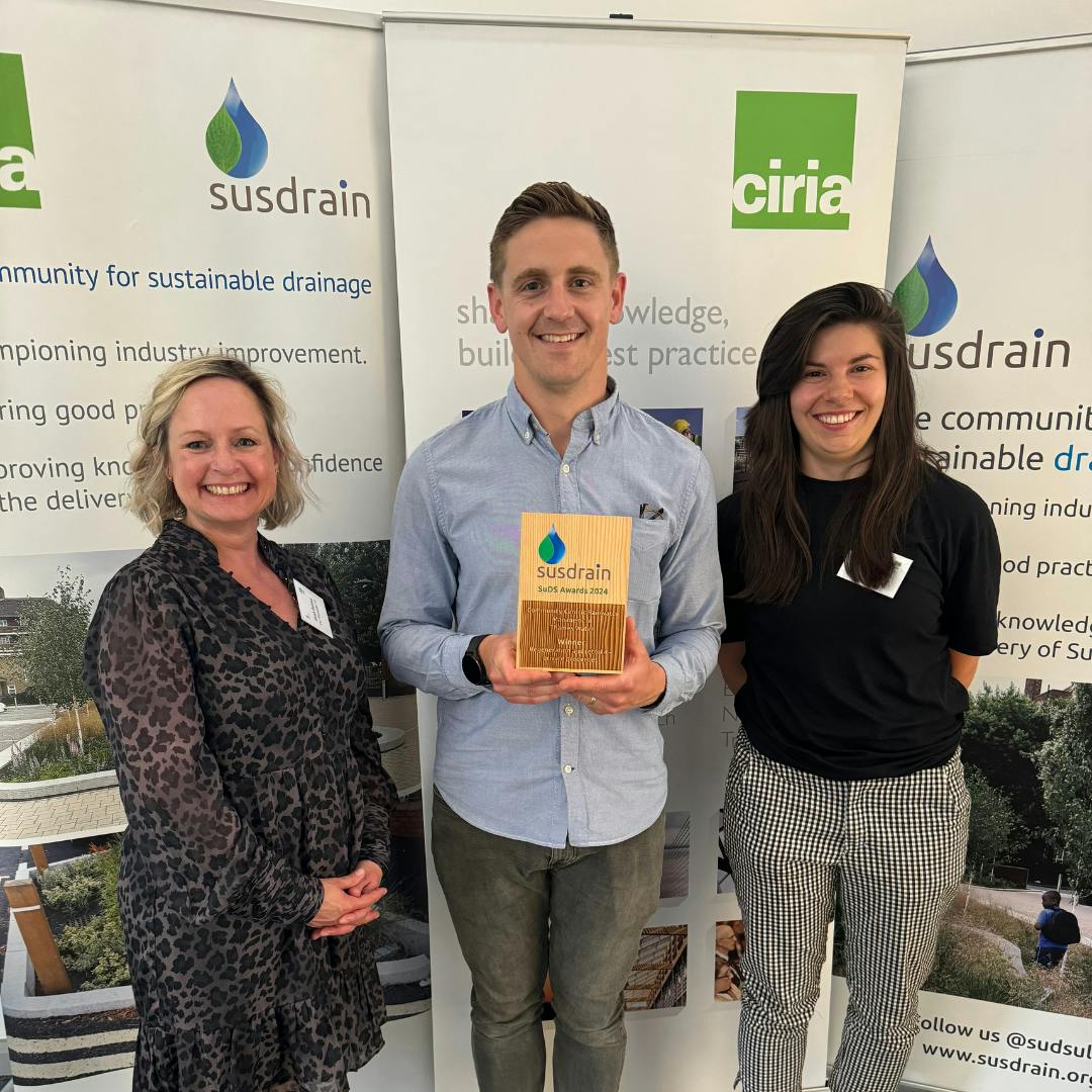 Sarah, Craig and Abbi holding Susdrain Award