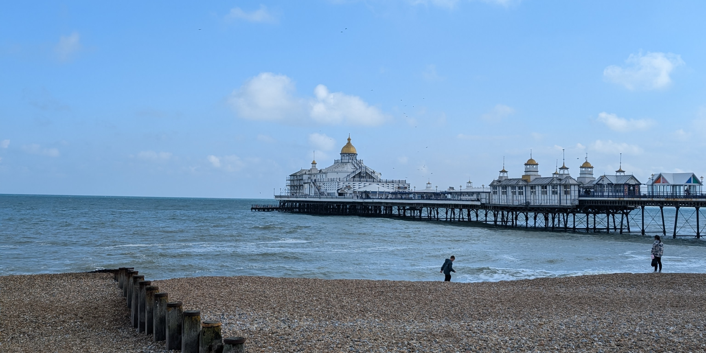 A picture of Eastbourne pier from the beach