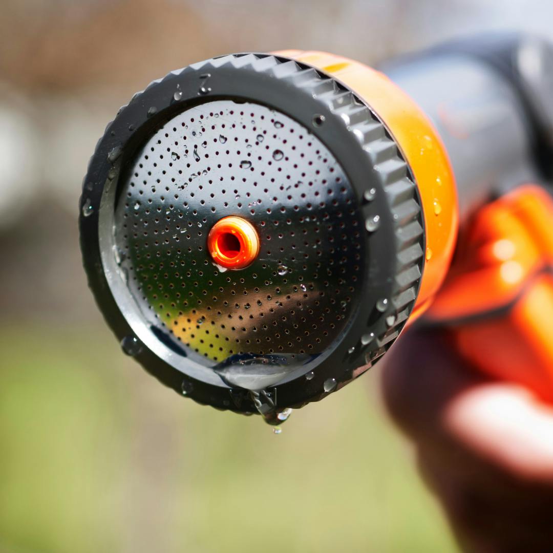 A standard garden hosepipe attachment facing the camera