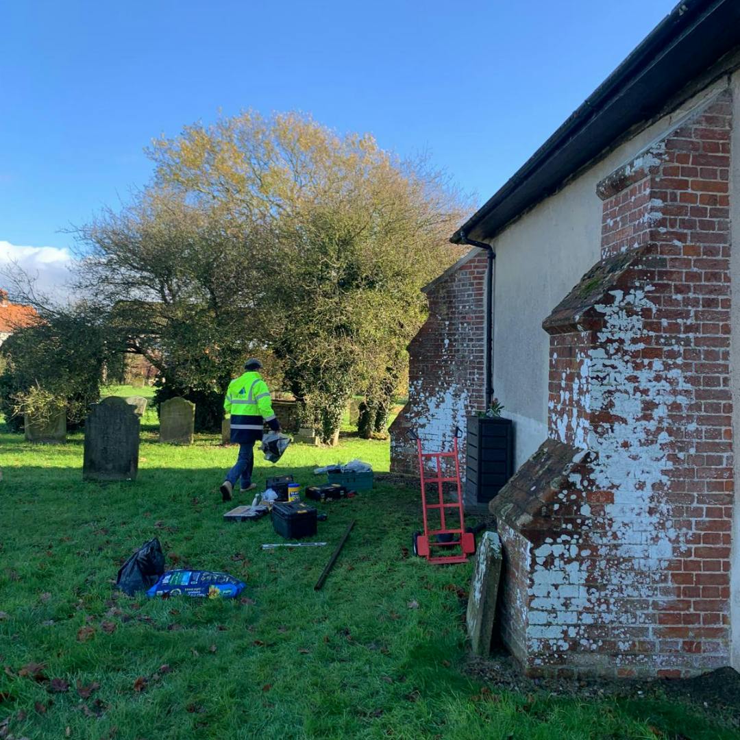 Installers installing at a church in Suffolk