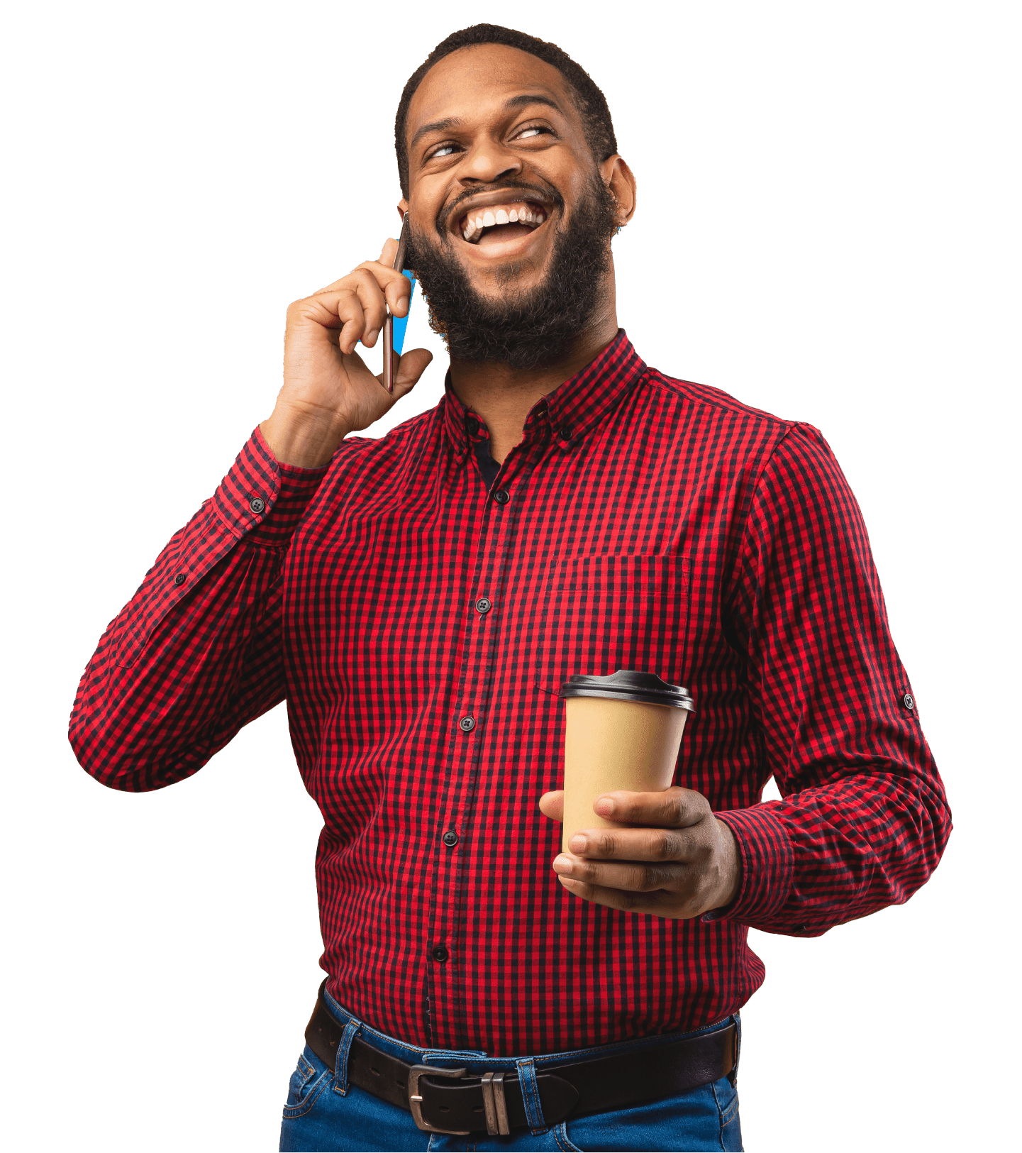A Black man in a red plaid shirt holds a coffee while talking on the phone.