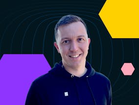 Co-founder of Epicbrief Anton Dobrazhanskiy against a black ground with three colorful hexagons.