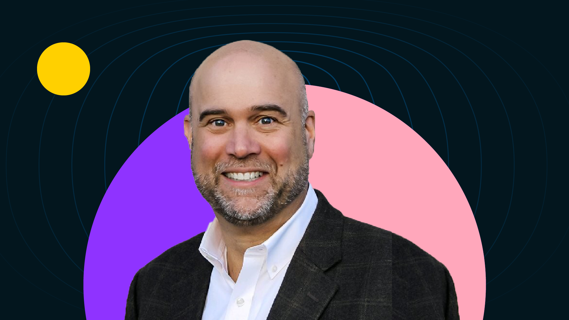 Founder of Ignite Selling Steve Gielda smiles while wearing a suit jacket and white collared shirt.