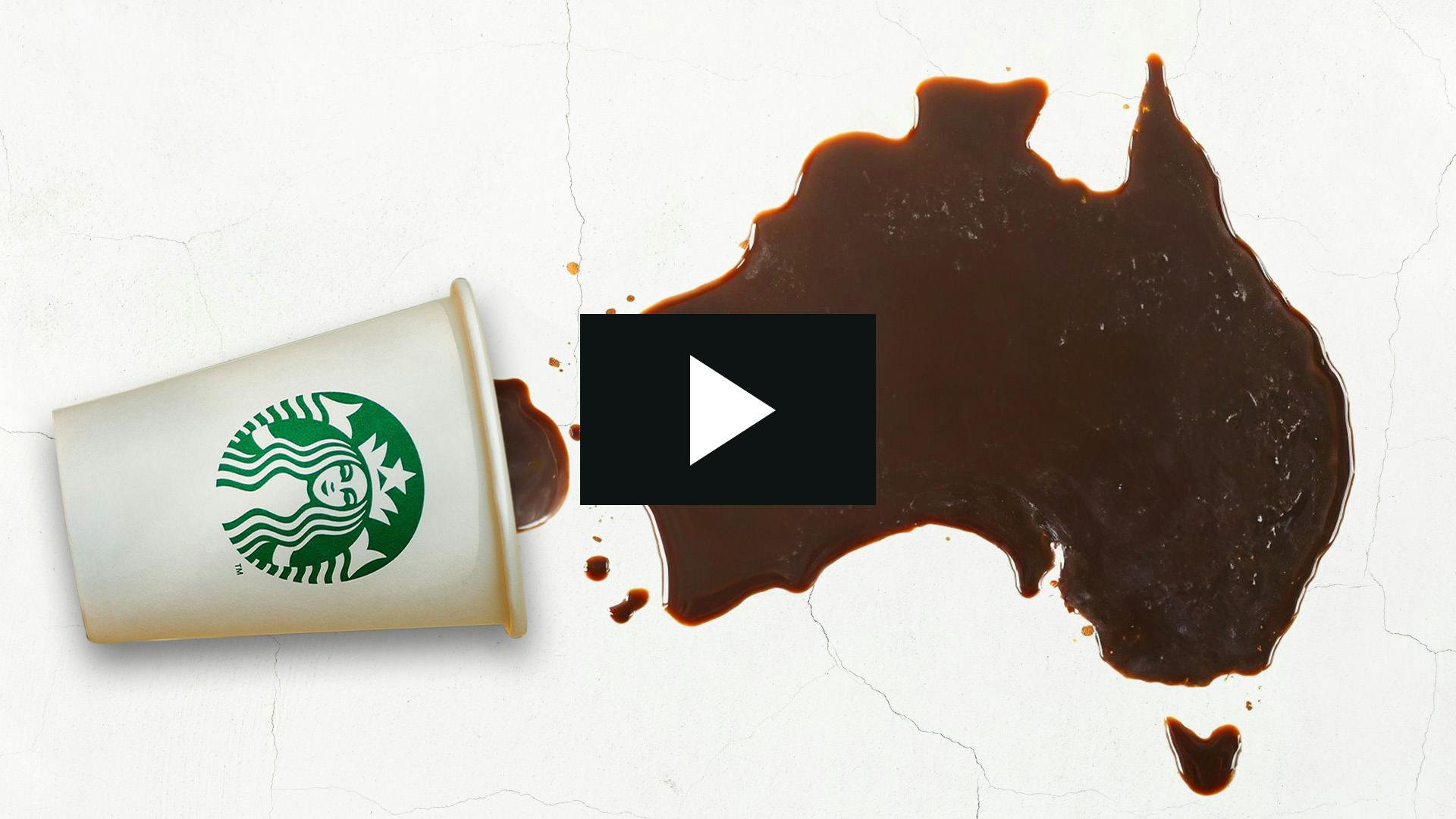 Starbucks coffee cup spilling coffee in the shape of Australia