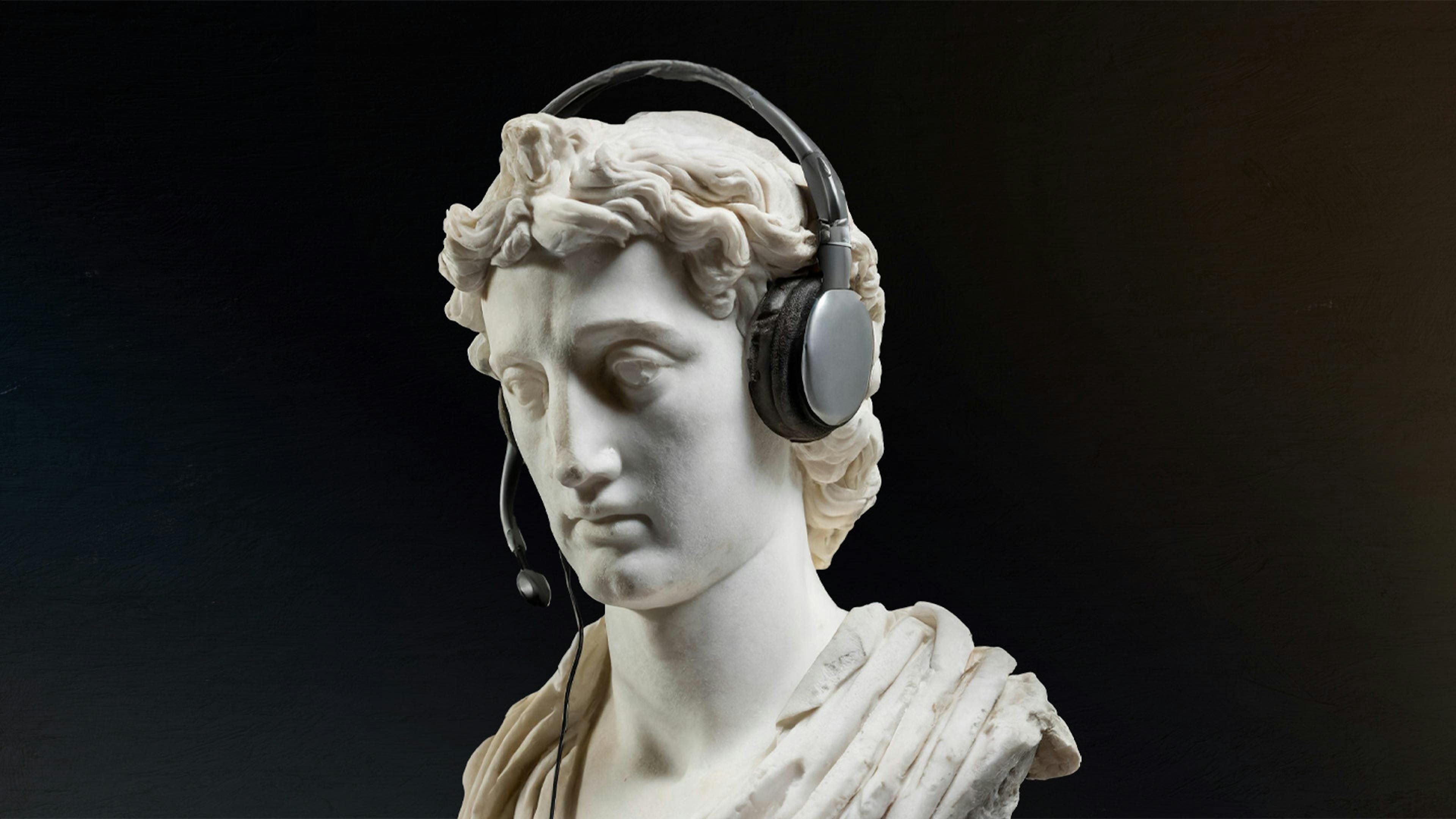 Roman statue with headset on