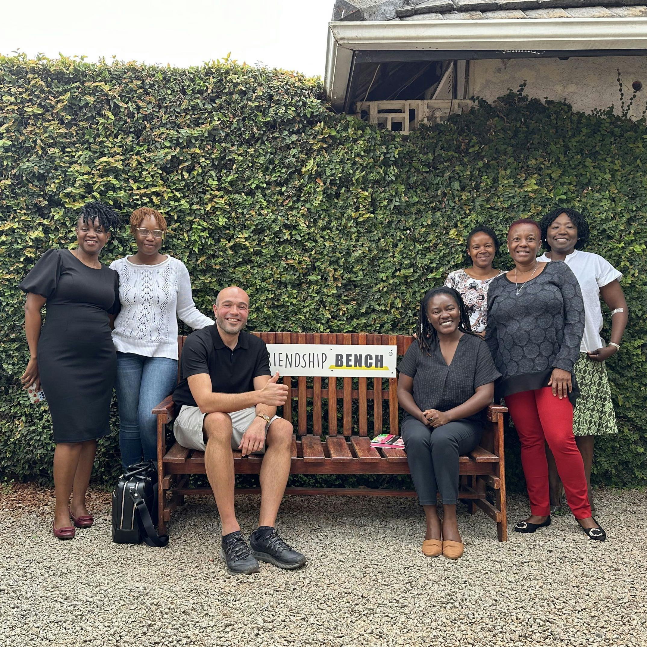 Nicholas Palahnuk with the leadership team of Friendship Bench in Harare, Zimbabwe.