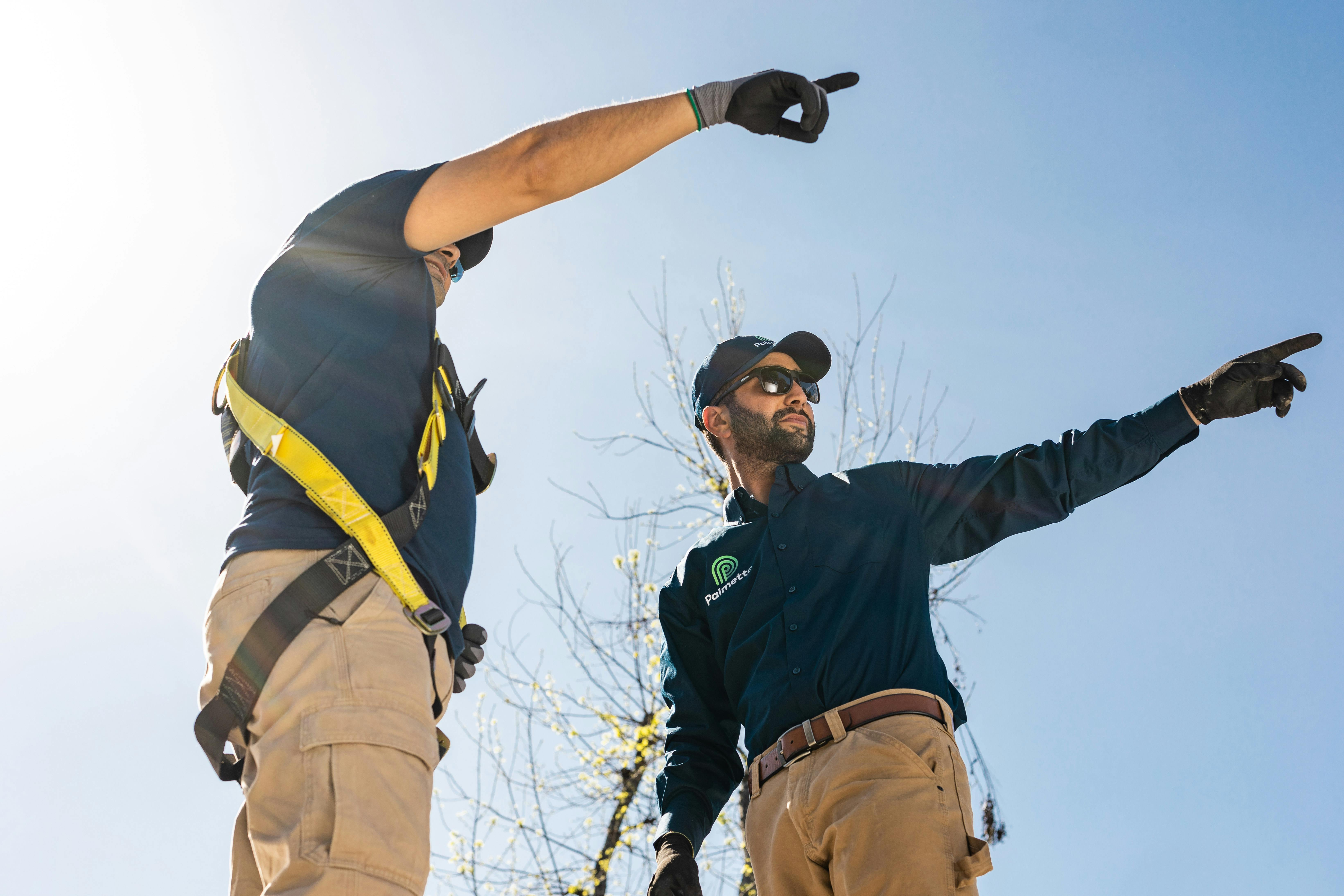 solar panel installers mapping out collection