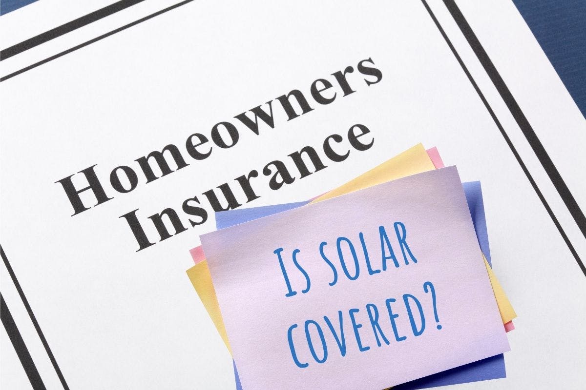 A document entitled "Homeowners Insurance" has notes stacked on top, including one with the words "Is Solar Covered?" as a homeowner researches the relationship between homeowners insurance and solar panels.