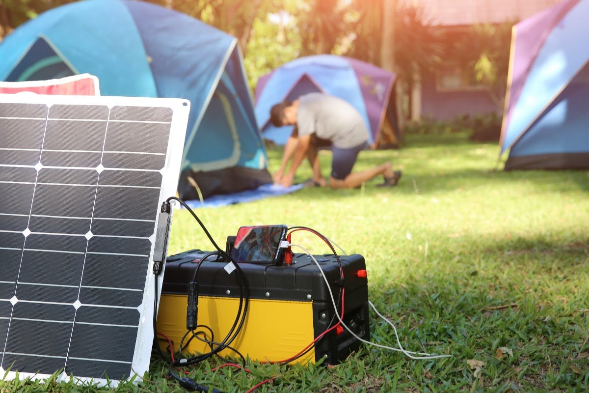 A solar generator being used to provide portable solar power and clean energy while camping.