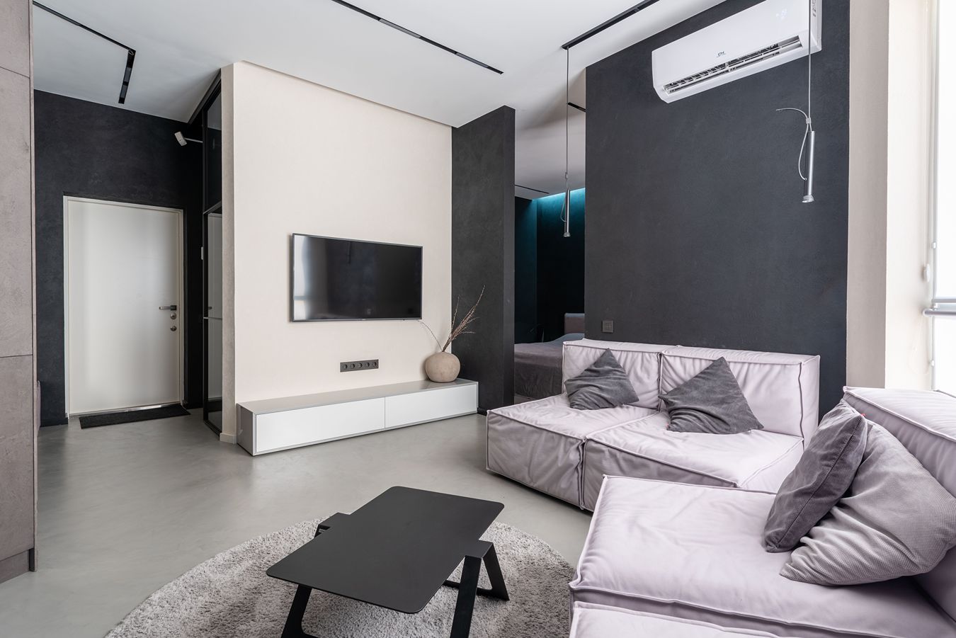 A mini-split air conditioner in a modern room.