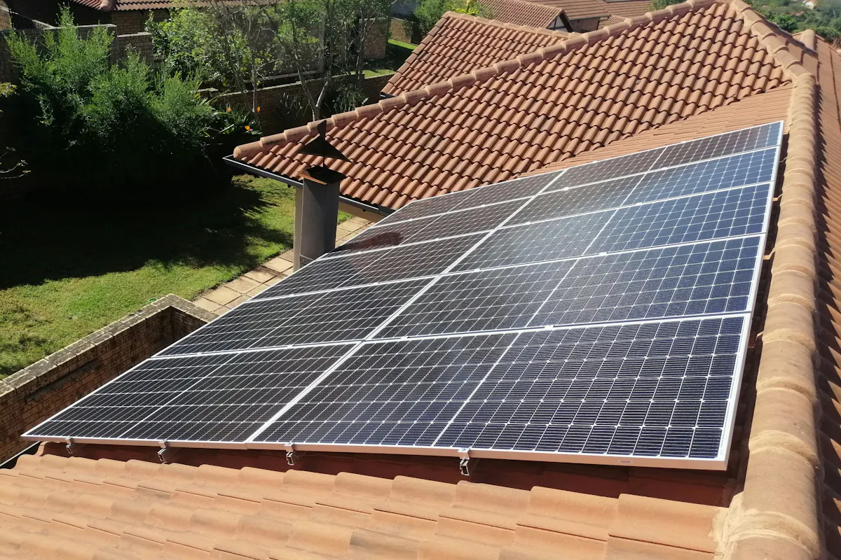 Solar panels on a tile roof.