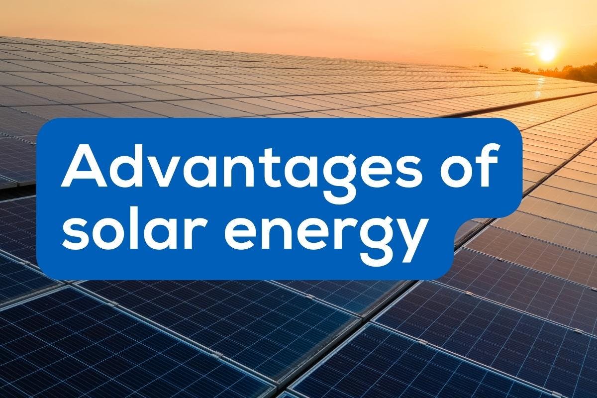 The words "advantages of solar energy" within a blue border on top of hundreds of solar panels with a sunrise in the background