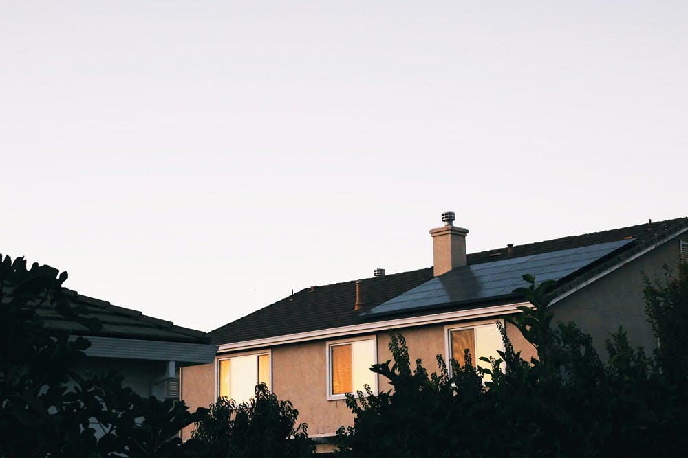 Rooftop solar panels at sunset. Credit: Giorgio Trovato