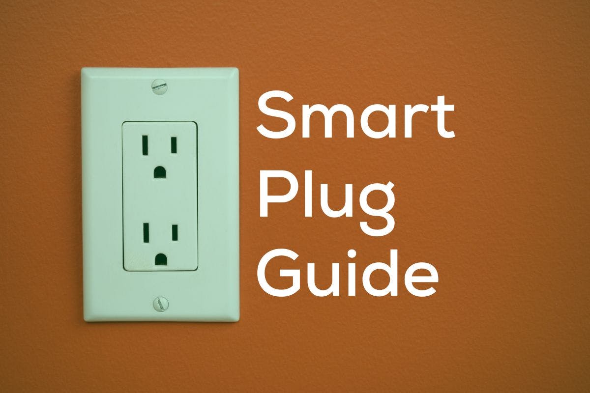 A wall outlet with the words "smart plug guide" beside it.