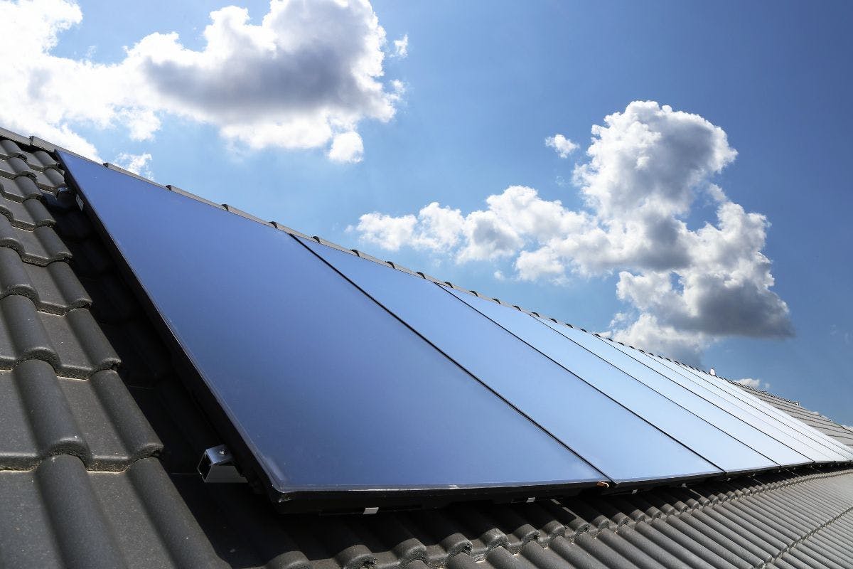 Solar panels on a tile roof.
