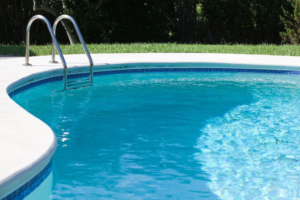 A swimming pool on a sunny day.