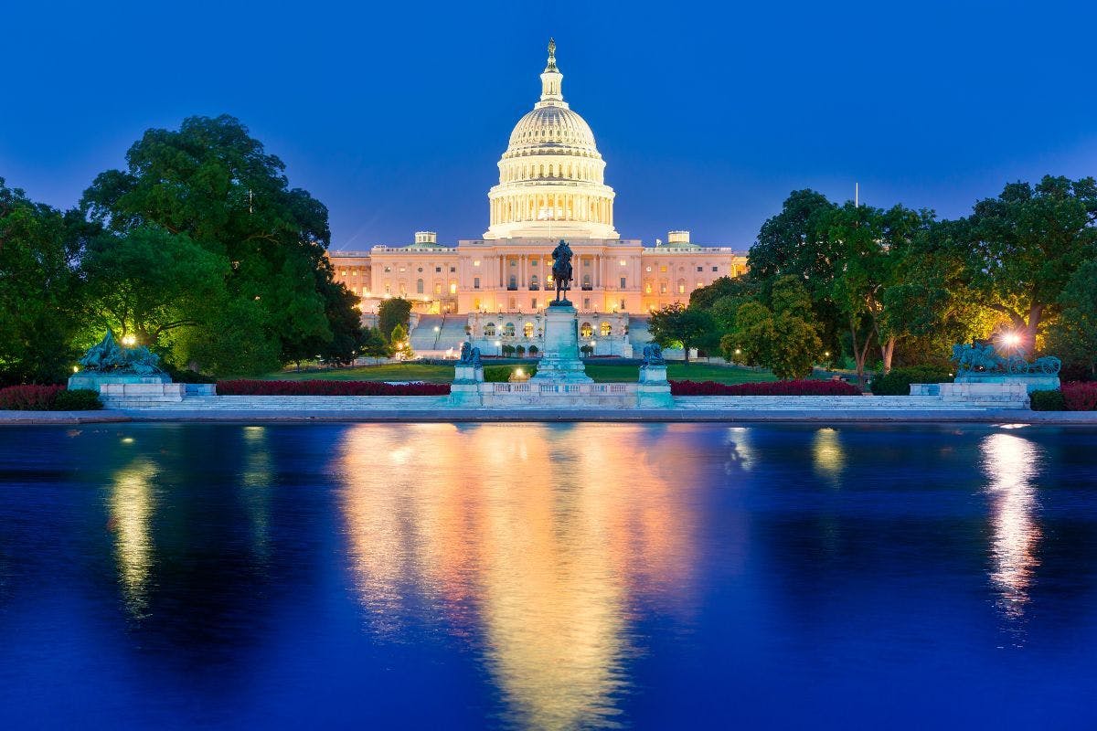 The US Capitol at night.