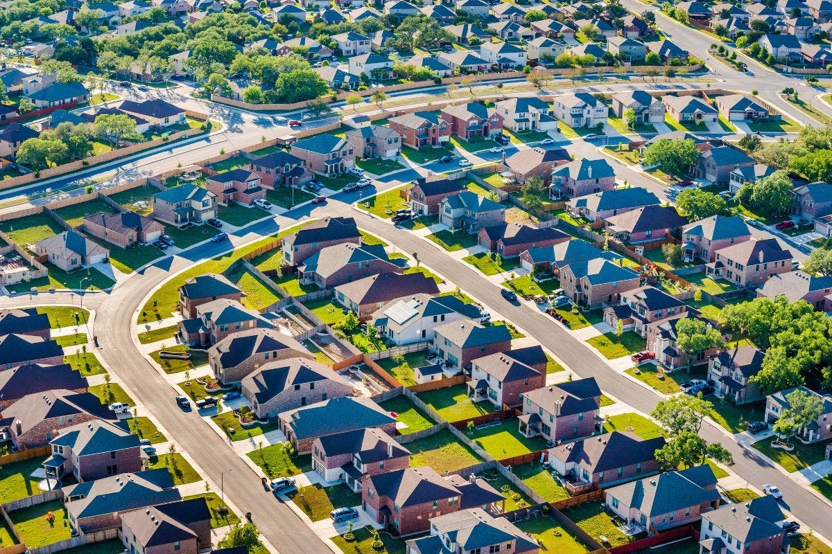A residential neighborhood pictured from the air.
