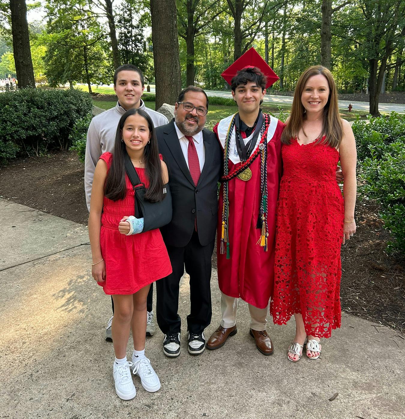 Neil Chatterjee with his family at a graduation.