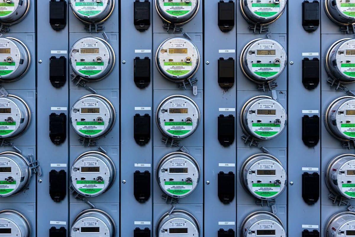 A wall of electric meters.