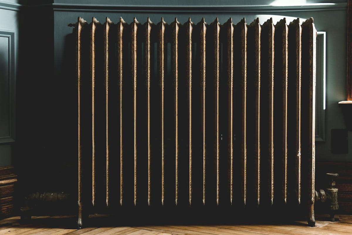 A radiator powered by a heating oil boiler.