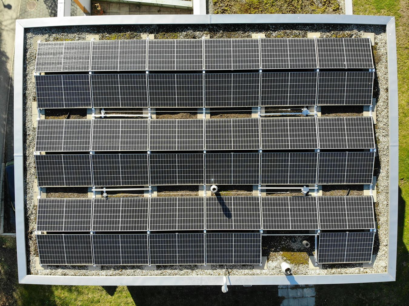Solar panels installed on a large flat roof.
