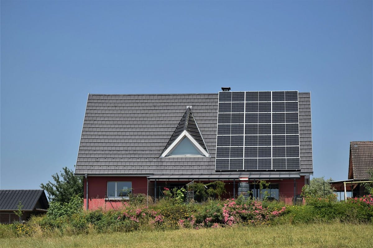 A home with rooftop solar panels.