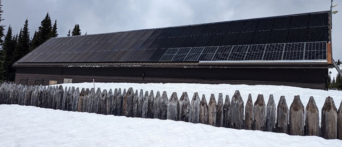 A solar panel array and snow in Mt. Rainier National Park