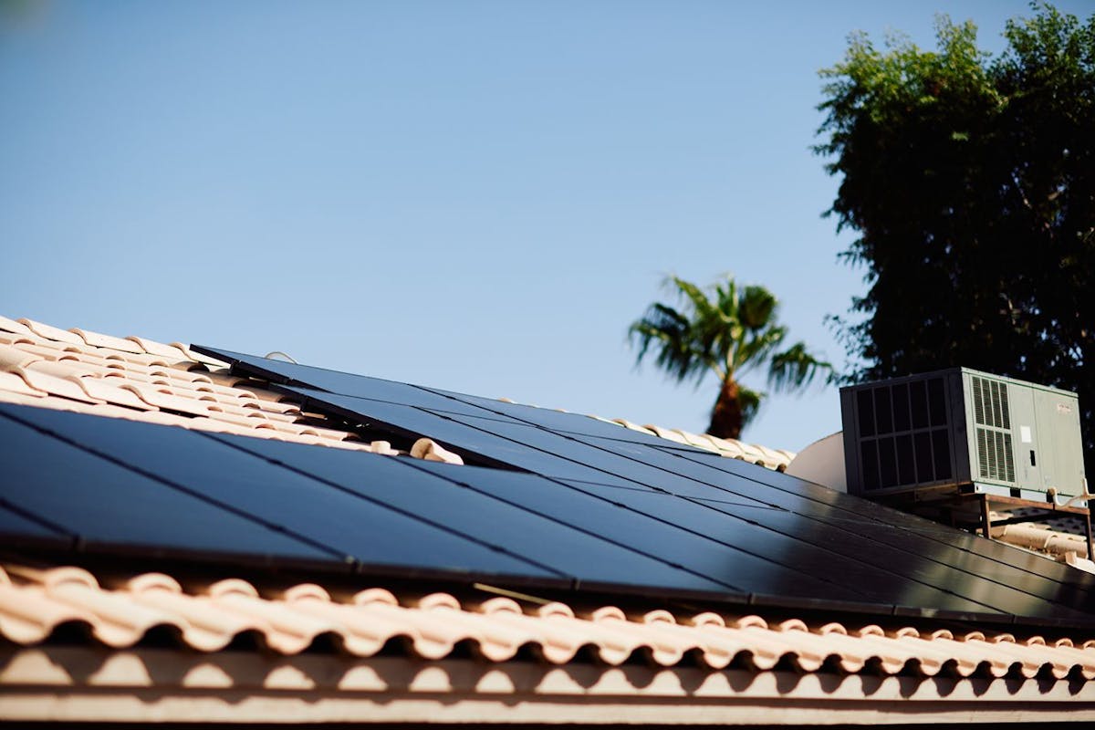 Solar panels on a tile roof.