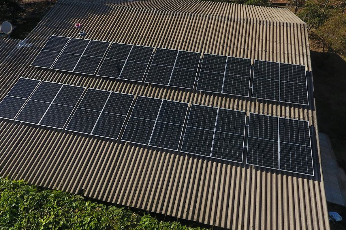 Residential rooftop solar panels seen from above.