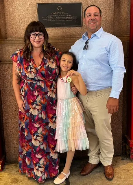 Courtney DeLena with her family.