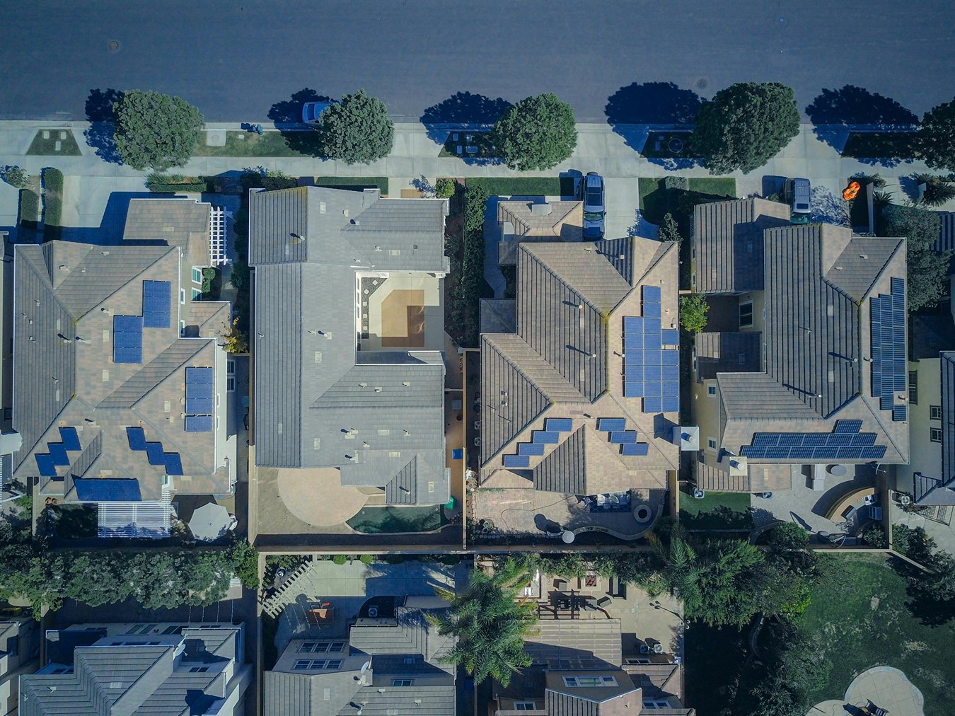 Rooftops with solar panels from the air.