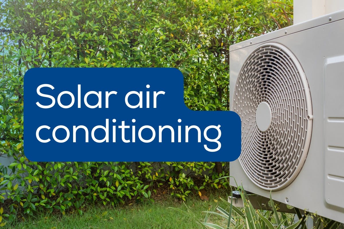 The words "Solar Air Conditioning" over an image of a mini-split a/c unit, representing how to cool your home with solar to save money.