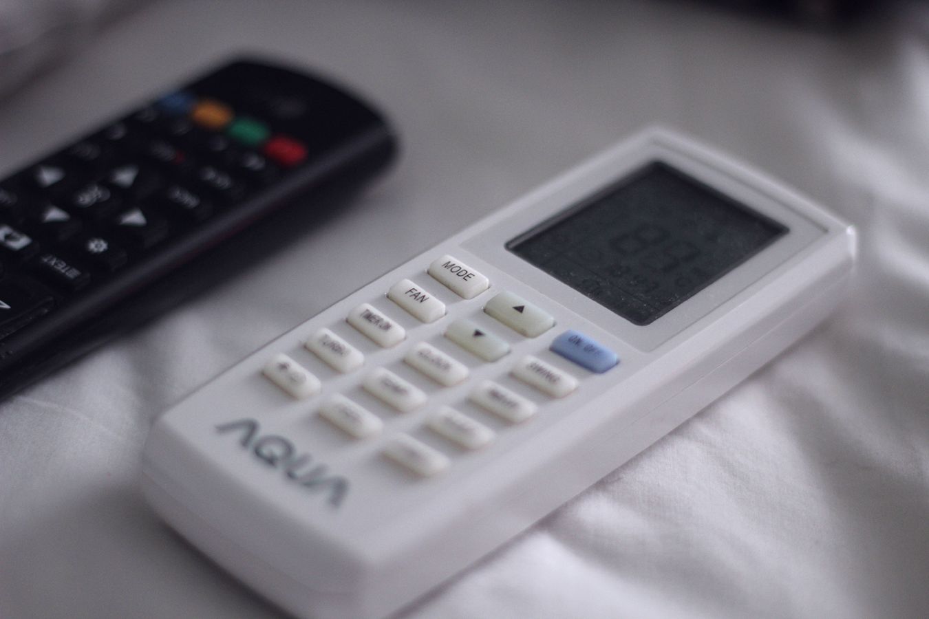 A remote control like one used for a portable air conditioner.